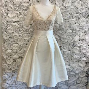 Ivory dress with lace detail on top